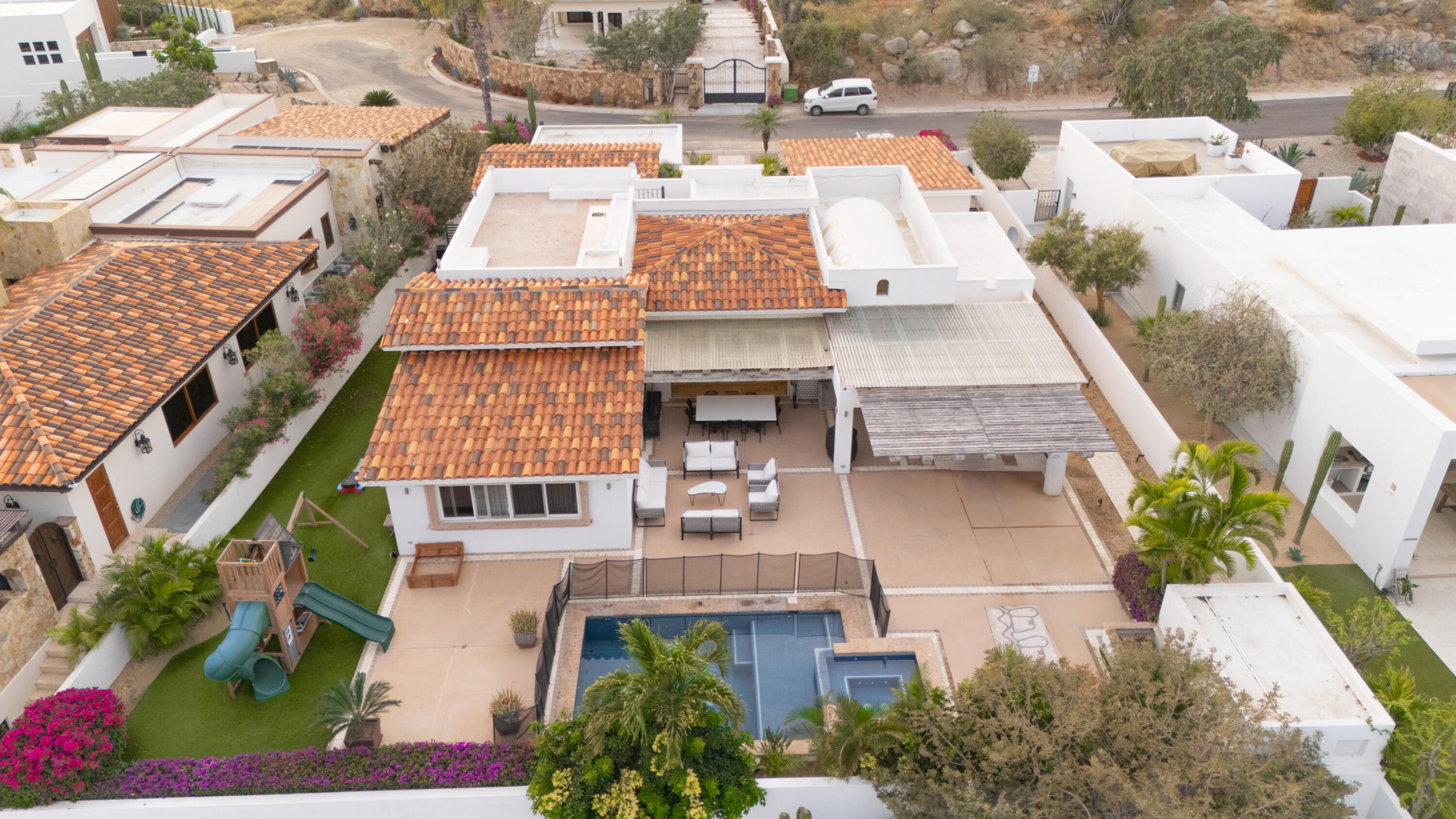 Pedregal Cresta Del Mar Mediterranean-style Home with a poolside bar and generously proportioned patio with its water features, putting green, pool and spa create a playful inviting atmosphere where friends and family will want to gather. Sunset cocktails atop the rooftop deck with its arch – 119, Cresta del Mar, Cabo Corridor, Cabo Corridor, BS