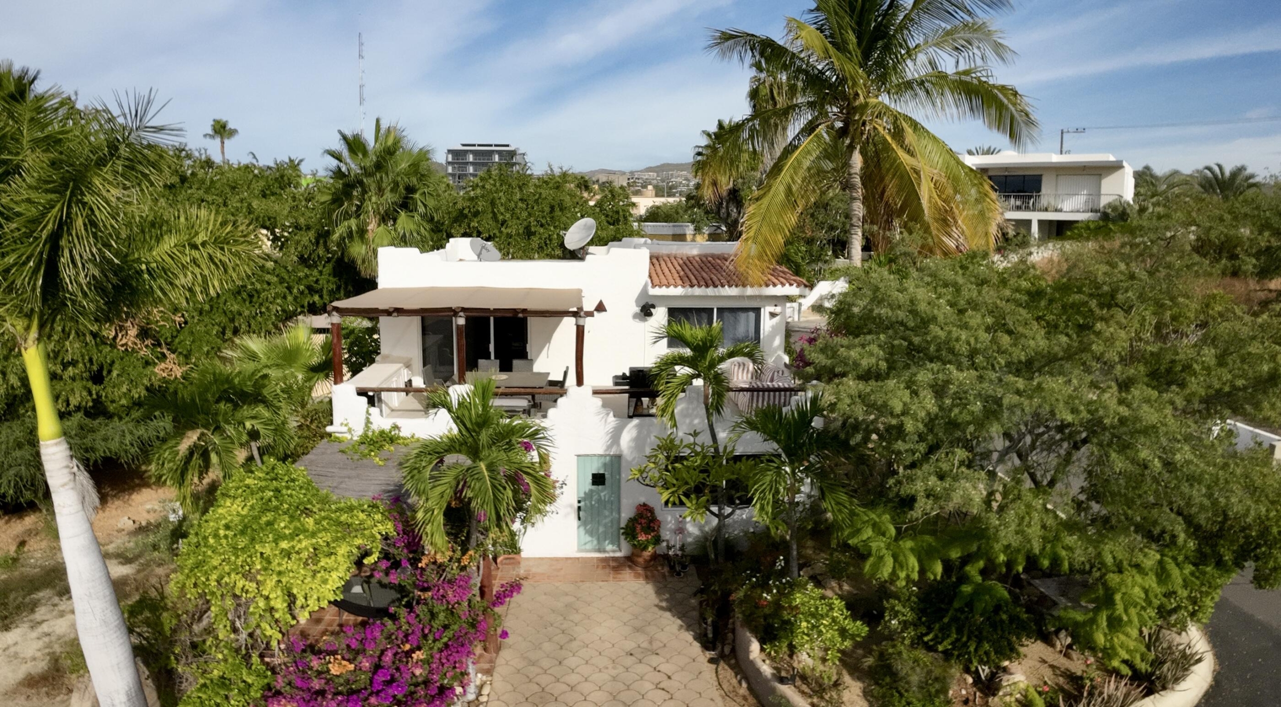 Pedregal Cabo Bello Located in the desirable gated community of Cabo Bello, this duplex residence offers flexibility, privacy, and excellent income potential. Designed as two fully independent living spaces, the property features a total of five bedrooms, two kitchens, and two BBQ areas, ideal for large families or owners seeking to live in one unit while renting the other.One of Cabo Bello's standout features is its swimmable beach, one of the best in the Tezal area, just minutes away. Known for its security and peaceful atmosphere, the community offers gated access and 24/7 surveillance.Conveniently located near Fresko, Costco, Home Depot, and some of Cabo San Lucas' top restaurants, this property is perfect as a full-time residence, vacation home, or smart investment opportunity. – 119A Paseo de Los Cabos, Cabo Corridor, BS