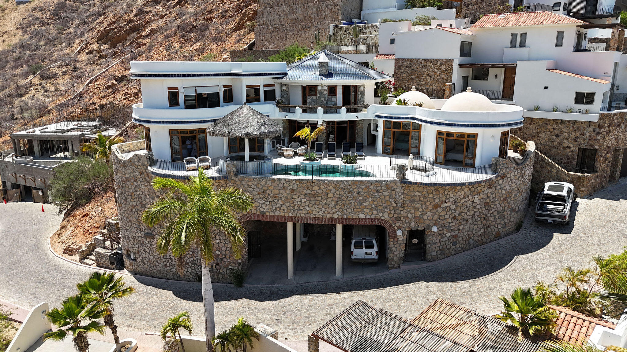 Pedregal Pedregal Csl Casa Bella redesigned encompasses a warm modern style combined with abundant lush landscaping.Situated on a large private corner lot with unobstructed oceans for sale