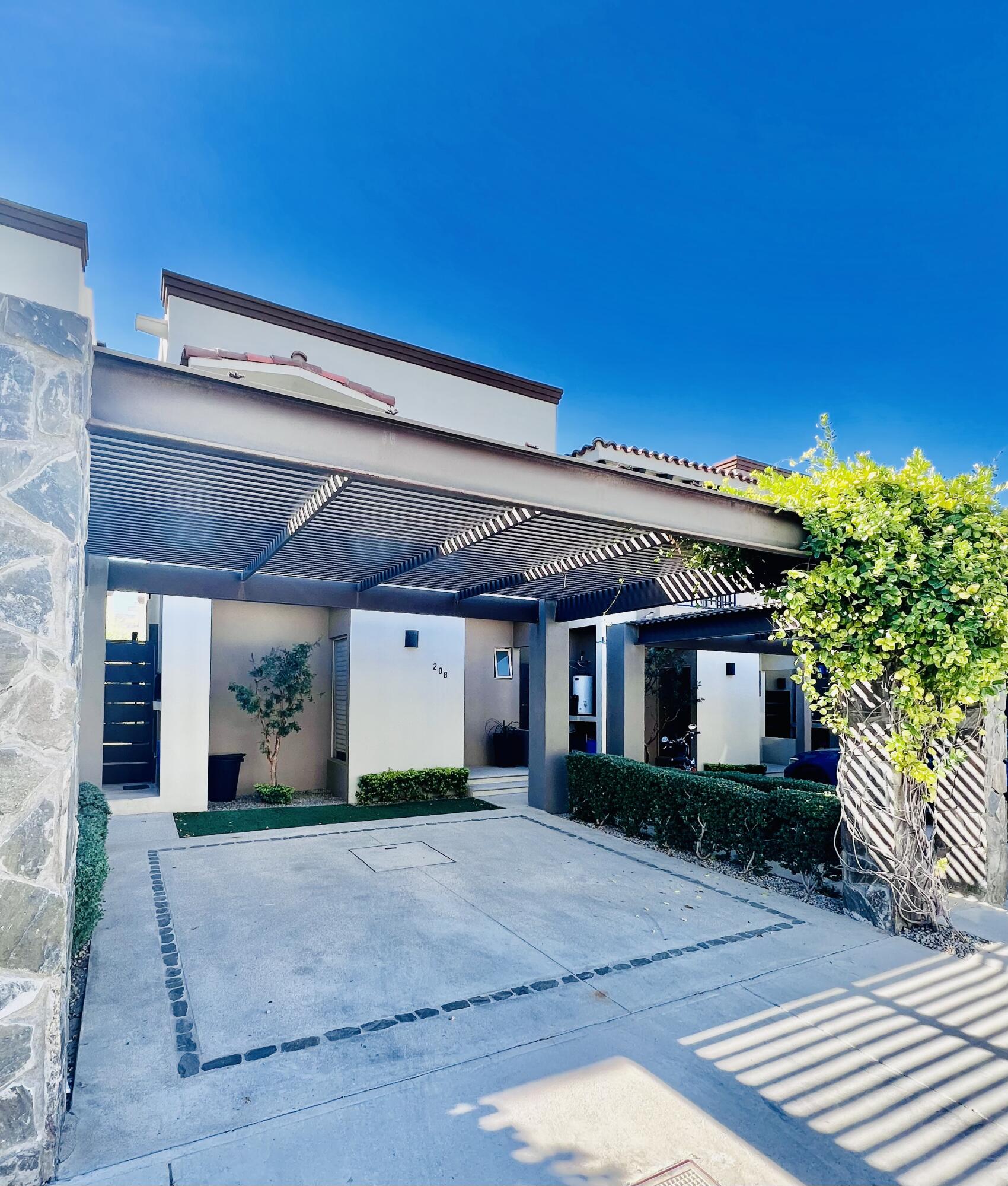 Pedregal Las Playitas Perched above the Pacific coastline, this elegant two-story California Colonial residence captures spectacular sunset – 208 El Tezal, Cabo Corridor, BS