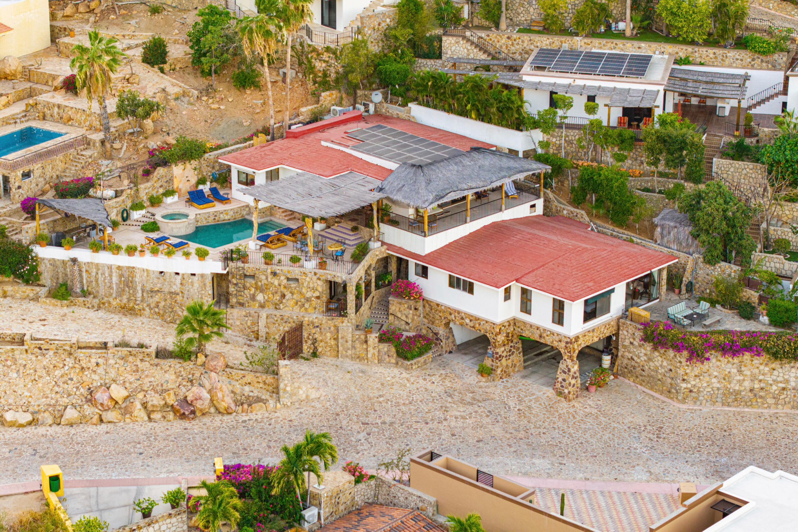 Pedregal Pedregal Csl Villa Felicidad is a 5-bedroom, 5.5-bath residence in Pedregal that combines scale, location, and proven income potential. Set just minutes from the main gate and within walking distance to the marina, it offers effortless access to Cabo's best dining and nightlife while maintaining privacy. The home features a private pool, expansive terraces, and panoramic marina for sale