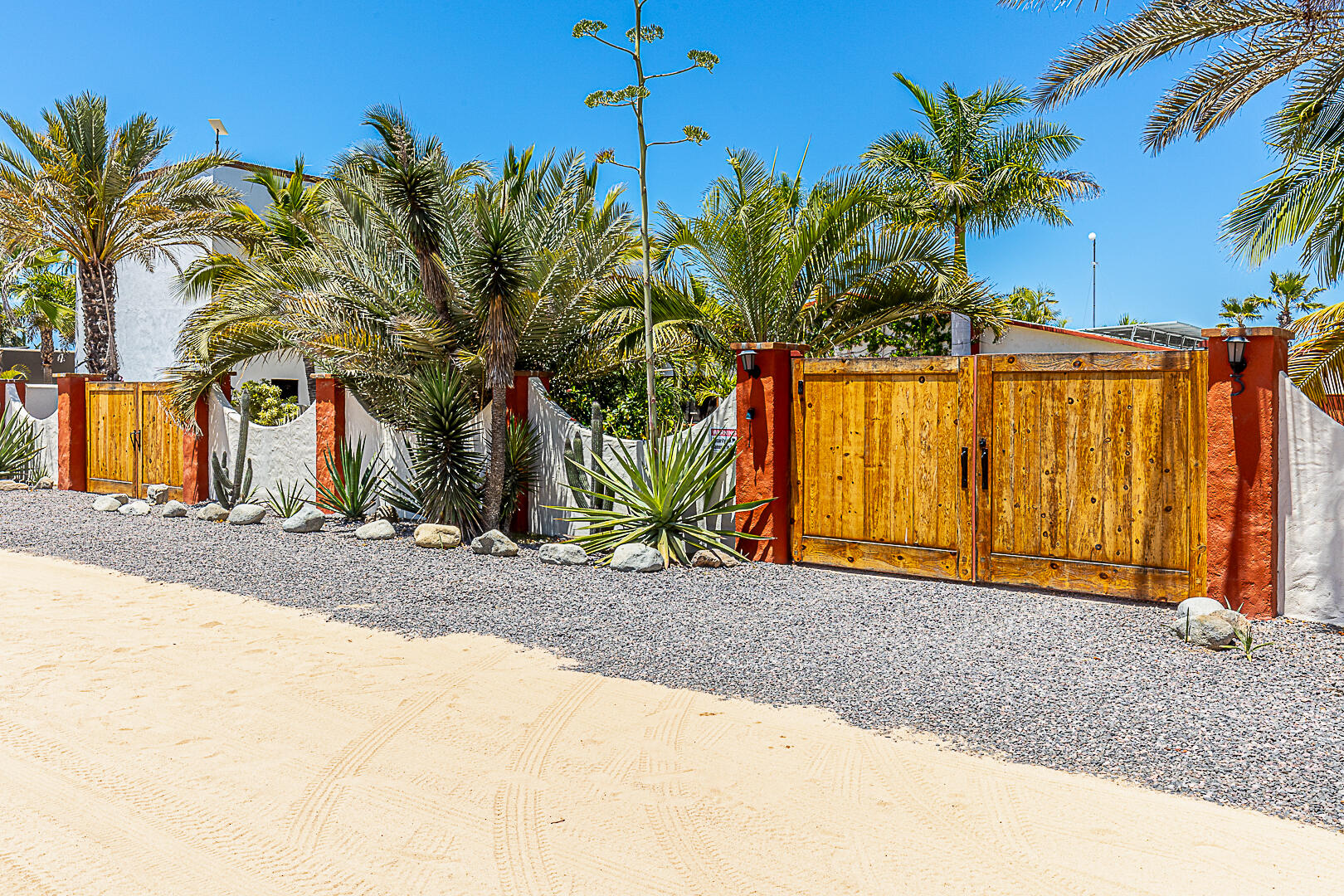 Pedregal Rancho Nuevo Tucked away within the gated community of Rancho Nuevo, complete with a security gate system, this inviting one-story ranch-style home offers space, privacy, and relaxed coastal living--just 500 steps from a wide, untouched stretch of coastline. Designed with a flowing open floor plan, the home opens into an expansive living room anchored by a warm wood-burning fireplace--perfect for cozy evenings and effortless entertaining. The kitchen is truly the heart of the home--a huge gourmet entertaining kitchen with abundant space for cooking, gathering, and hosting--complemented by a separate dining room ideal for more formal meals and gatherings. The home features three bedrooms and two bathrooms, highlighted by an oversized primary suite designed for comfort and privacy The home features three bedrooms and two bathrooms, highlighted by an oversized primary suite designed for comfort and privacy. Two guest bedrooms provide practical accommodations for family and visitors, complemented by a notably large 2nd family style bathroom. Outdoor living is exceptional. A grand courtyard entry creates a private and welcoming arrival, while the expansive, low-maintenance backyard is designed for entertaining, complete with a barbecue area and traditional pizza oven. The pool has been fully remodeled with brand-new equipment, offering a refreshing retreat alongside a covered patio ideal for shaded lounging. An upper rooftop deck adds another layer of living space--perfect for enjoying ocean breezes, sunsets, and the quiet beauty of the surrounding landscape. The property is double gated with a circular drive, providing both privacy and convenience, and includes a one-car garage. Energy efficiency is already in place with a brand-new solar system and solar water heater. An abundance of water available via Rancho Nuevo's private community well. No trucked water. Located in a quiet, secure neighborhood near the serene, natural beaches of Rancho Nuevo--known for their beauty and peaceful setting--this home offers a unique opportunity to enjoy the Baja lifestyle in a tranquil, uncrowded environment. – 3 calle sin nombre, Pacific, BS