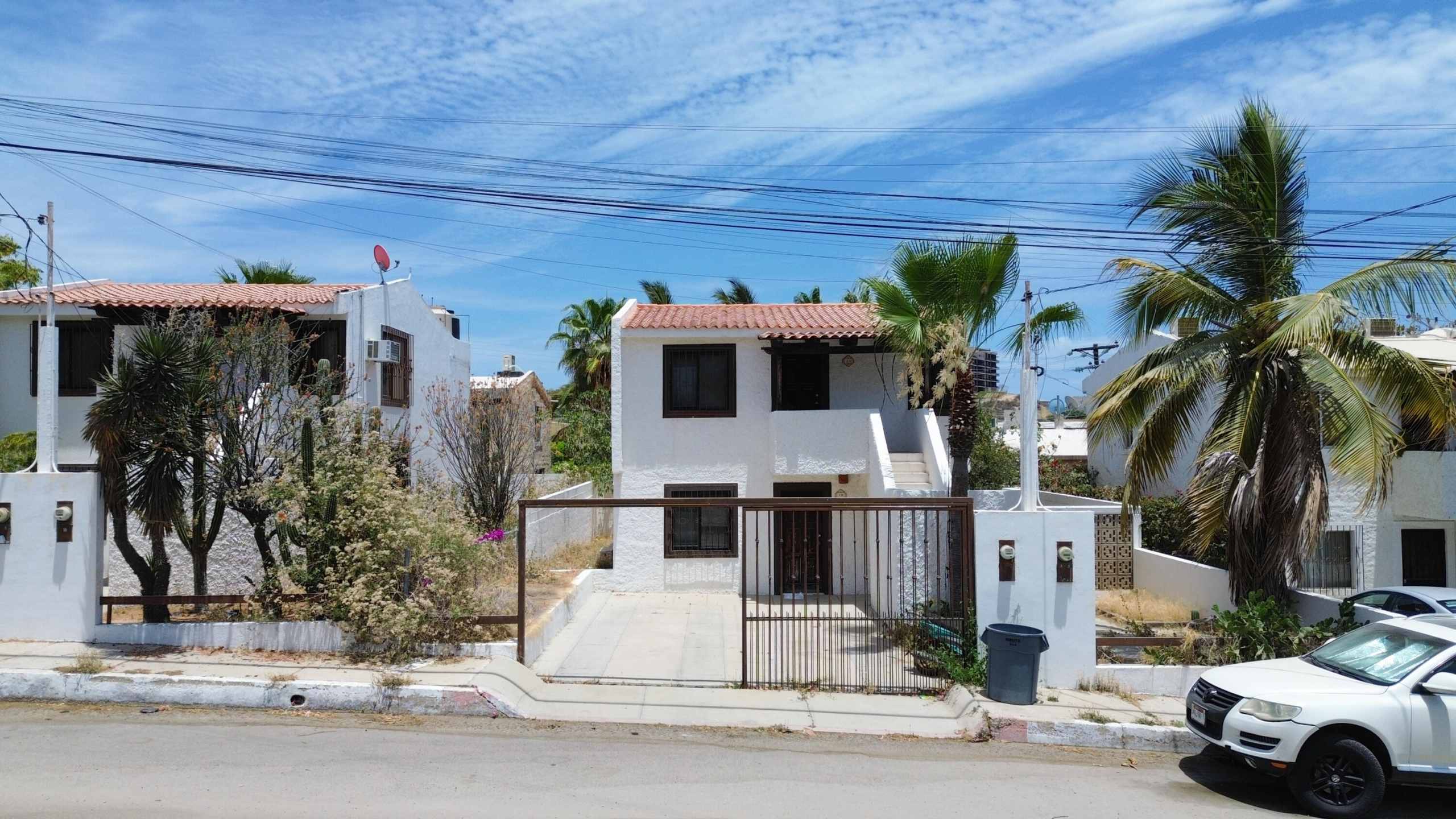 Pedregal Los Barriles This unique property is in a prime location.Just steps from the beautiful beaches of Los Barriles.You are in town so walking to multiple restaurants and shops is easy without a car.Upon entering from the street, on your left is the first garage with an attached bedroom,bathroom and a covered patio.The main house has 1 bedroom, 1 1⁄2 bathrooms, kitchen, dining area, laundry room and livingroom that opens to a large covered patio. On the other side of the patio are 2 bedrooms and 2bathrooms.Directly behind the 2 bedrooms and bathrooms is a casita with 1 bedroom, 1 bathroom, fullkitchen, dining area, living room, laundry room and covered patio.There is also a detached extra deep garage in the back of the property for storing cars, sideby sides, quads or gear. This 5-bedroom, 5.5-bathroom property with 2 garages and 2 laundry rooms is ideal for a winter getaway and offers great rental income opportunities. – 4 Braulio, San Jose del Cabo, BS