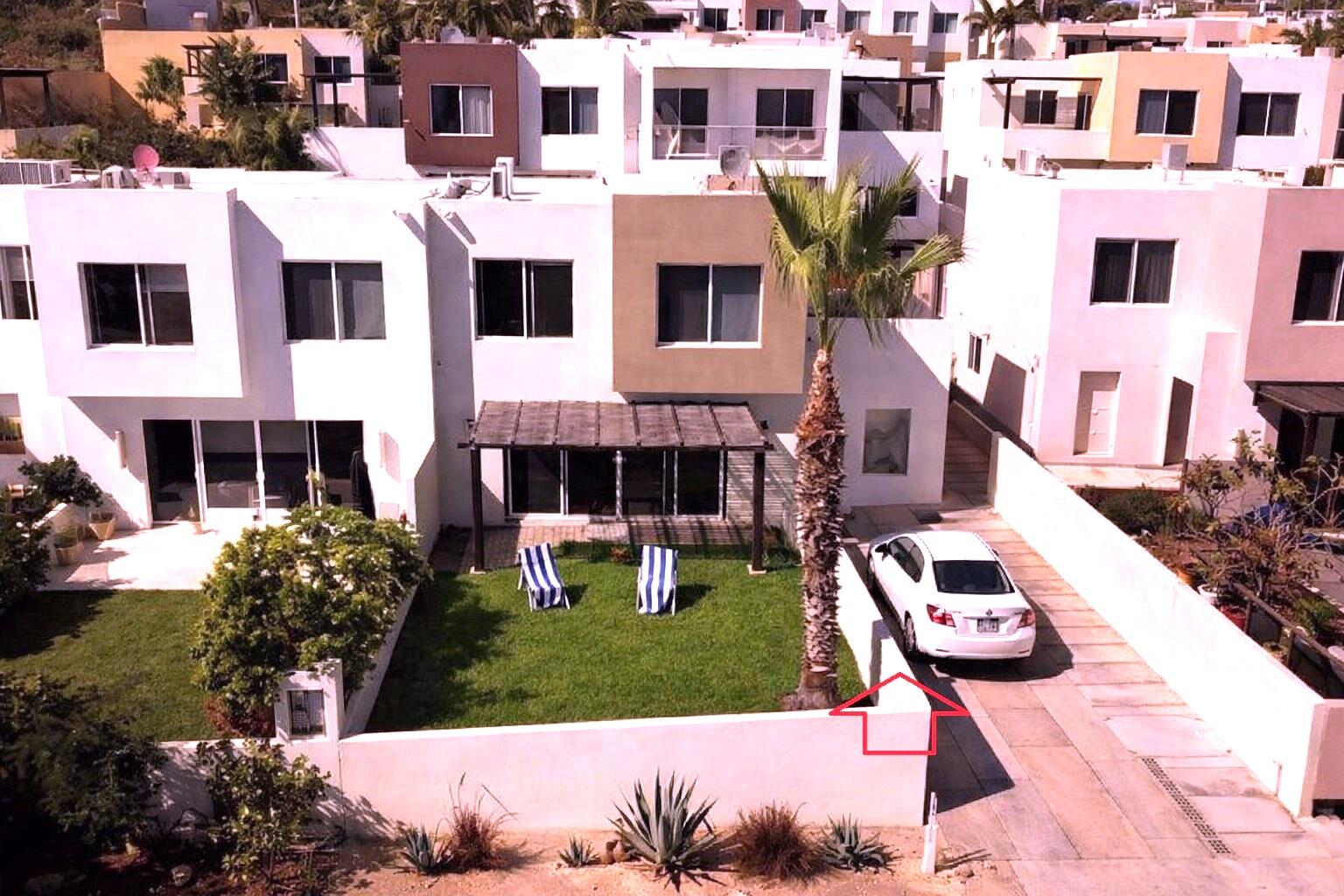 Pedregal El Tule-Inland:General Great opportunity!! Beautiful turnkey home ideal for a couple or small family.Originally designed as a 3-bedroom home, the downstairs bedroom was opened up to create a TV room/family room. However, it can easily be closed off again and converted back into a third bedroom if desired.The home also offers space to build a third bathroom and a walk-in closet for the primary bedroom, adding even more comfort and value to the property.Enjoy a cozy front yard, perfect for children to play or for relaxing outdoors in the sunshine. The community also features a common area with a swimming pool, bathrooms, and BBQ area.Located in a secure gated community with 24/7 security, this home offers an excellent location between Cabo San Lucas and San José del Cabo, just minutes from Chilen – 71 Circuito Los Tules, San Jose Corridor, BS