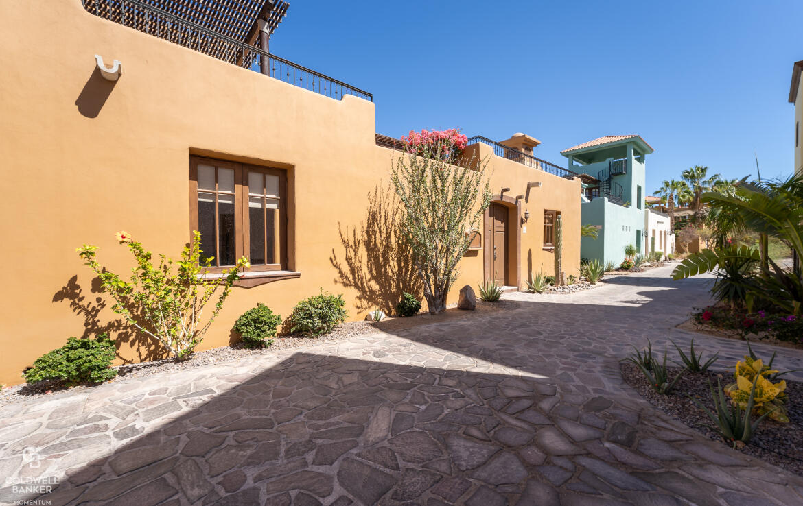 Pedregal Founders This well-maintained, turnkey 3-bedroom, 3-bathroom Encantada floor plan offers an exceptional layout, open on two sides to maximize natural light and airflow. Ideally located just steps from the popular community pool, restaurants, and shops, this home is perfectly positioned for convenience and relaxation.Step into the beautifully landscaped interior courtyard, where a large water feature creates a tranquil setting for the main living area and first-floor master suite. Also on this level, you'll find a third bedroom or flex space and a laundry area for added convenience. The second level is designed for outdoor living, featuring a spacious terrace with an outdoor kitchen, perfect for lounging and dining while enjoying stunning – Calle Duval, Loreto, BS