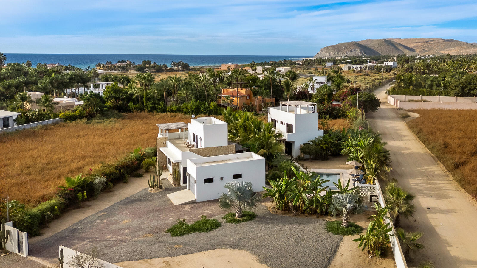 Pedregal Cresta Del Mar Mediterranean-style Home with a poolside bar and generously proportioned patio with its water features, putting green, pool and spa create a playful inviting atmosphere where friends and family will want to gather. Sunset cocktails atop the rooftop deck with its arch – Casa Alegria, Pacific, Pacific, BS