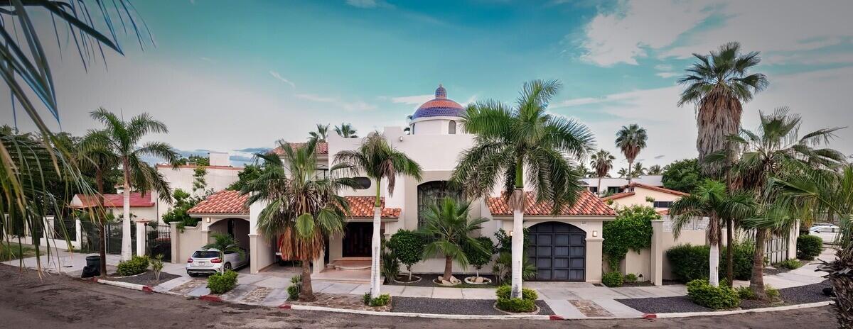 Pedregal Las Playitas Perched above the Pacific coastline, this elegant two-story California Colonial residence captures spectacular sunset – De Las Ballenas, La Paz, BS