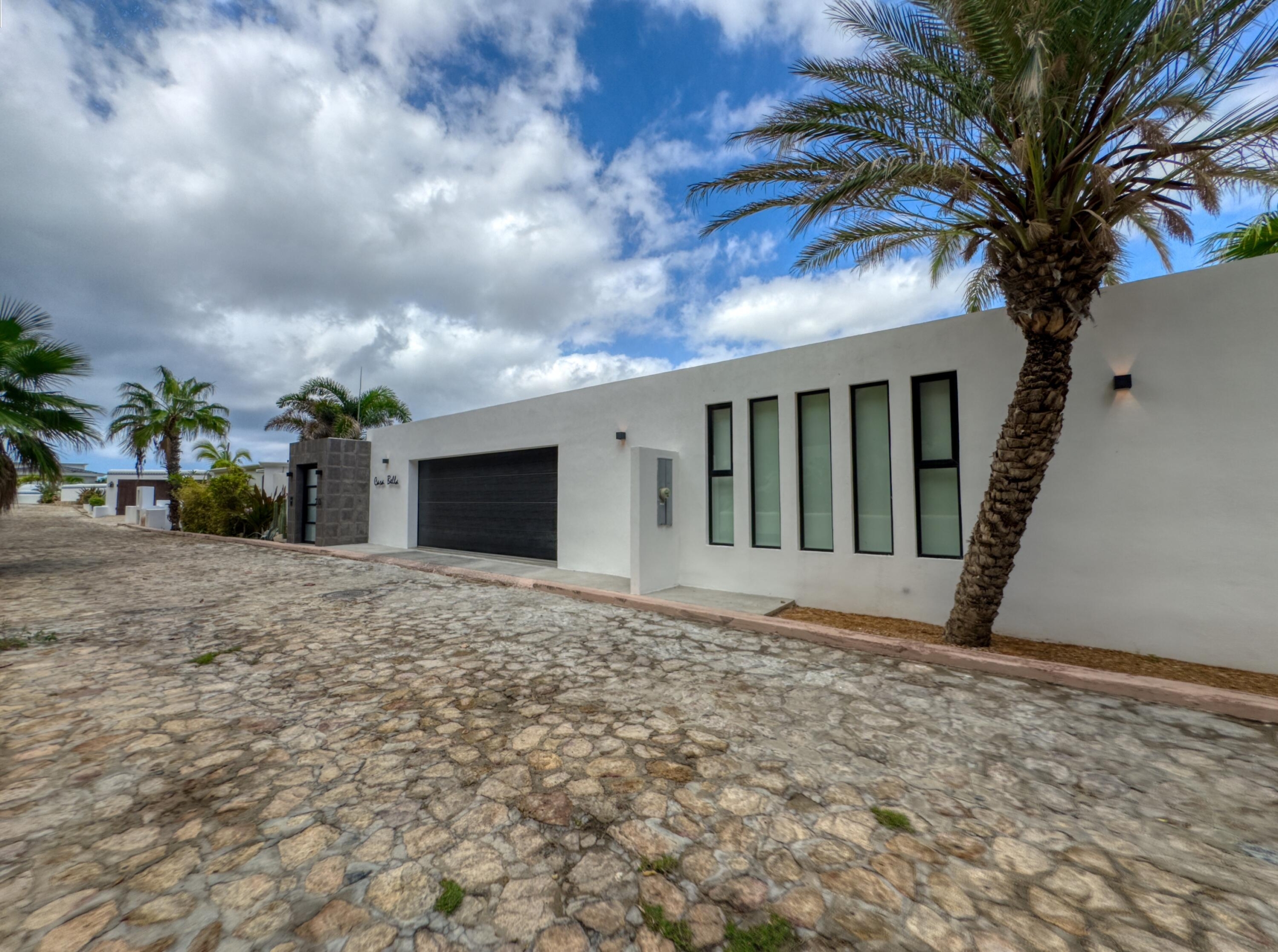 Pedregal Pedregal Csl Casa Bella redesigned encompasses a warm modern style combined with abundant lush landscaping.Situated on a large private corner lot with unobstructed oceans for sale