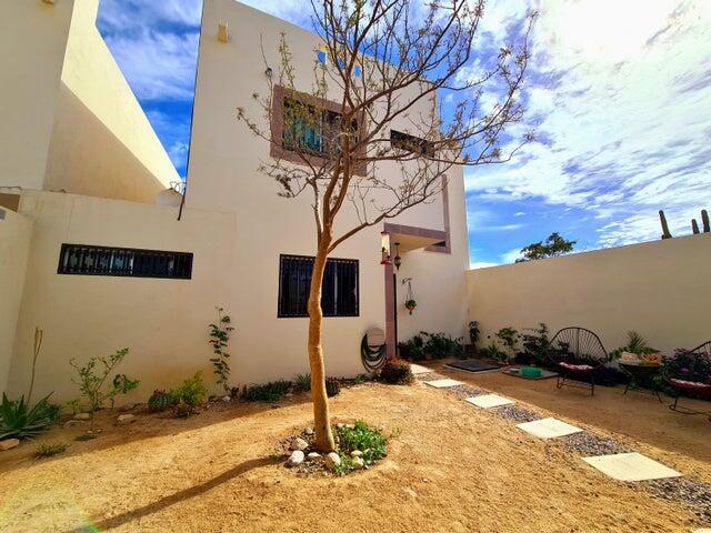 Pedregal Csl N-E Of19:Genral GREAT INVESTMENT OPPORTUNITY - ENDLESS POSSIBILITIES!Discover the untapped potential of Casa Altezza, a spacious single-family home nestled in a sought-after residential community in northern Cabo San Lucas, conveniently located off Highway 19 and Tamaral Ave. What sets this property apart? THE LARGEST LOT! in its phase, offering unique development potential! Expand the current home, add residential rental-rooms, design a covered garage, or build the ultimate entertainment space with seamless access--this property's extra land is a blank canvas for creativity and investment. Completed in April 2022, Casa Altezza features 3 bedrooms and 2.5 bathrooms, including an ensuite bath in the master bedroom. The home boasts a spacious front patio with mature plants and trees, along with a private back patio with partial concrete flooring.Several thoughtful upgrades include: - Custom-designed kitchen with a modern, minimalist concept and an expanded window for ample natural light. - Enclosed bonus room for laundry and storage. - High 2.5-meter privacy walls surrounding the property. - Iron-protected doors and windows with installed screens. - Abundant water supply with a total of 23,700 liters, including two cisterns and a rooftop water tank. - New appliances, including a full-size washer & dryer, stove, hood, refrigerator, two inverter mini-splits, and ceiling fans.Casa Altezza sits in an ideal location, just 10 minutes from downtown Cabo San Lucas, Medano Beach, Puerto Paraiso Mall, and The Marina. Daily conveniences like supermarkets, shopping centers, medical facilities, and schools are just minutes away. Plus, the community is a gated neighborhood with electronic access, and a remarkably low HOA monthly fee of only for sale