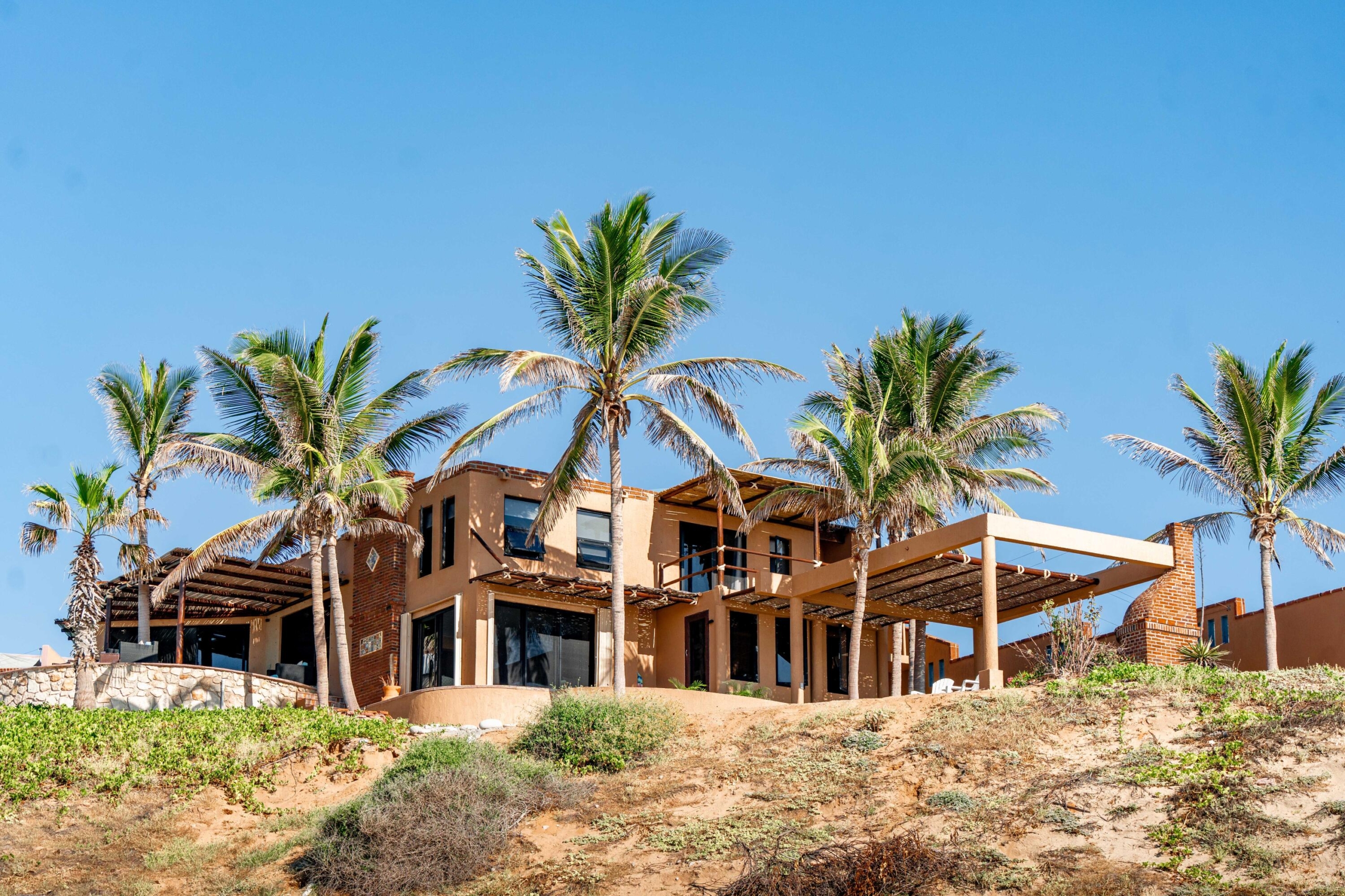 Pedregal Todos Santos-General Casa Corfu brings Mediterranean flare to Todos Santos. This spacious 3 bed 3.5 bath home sits on an expansive half-acre lot, a rare find in Todos Santos, and offers exceptional potential for future additions such as a casita or a pool. The layout creates an easy flow and seamless connection between indoor comfort and outdoor living. The property is situated on the highly desirable beach side of Camino a Las Playitas and is a very short walk to the beach. You will enjoy unobstructed, 360-degree – Lot A Zacatitos Beachfront, East Cape, BS