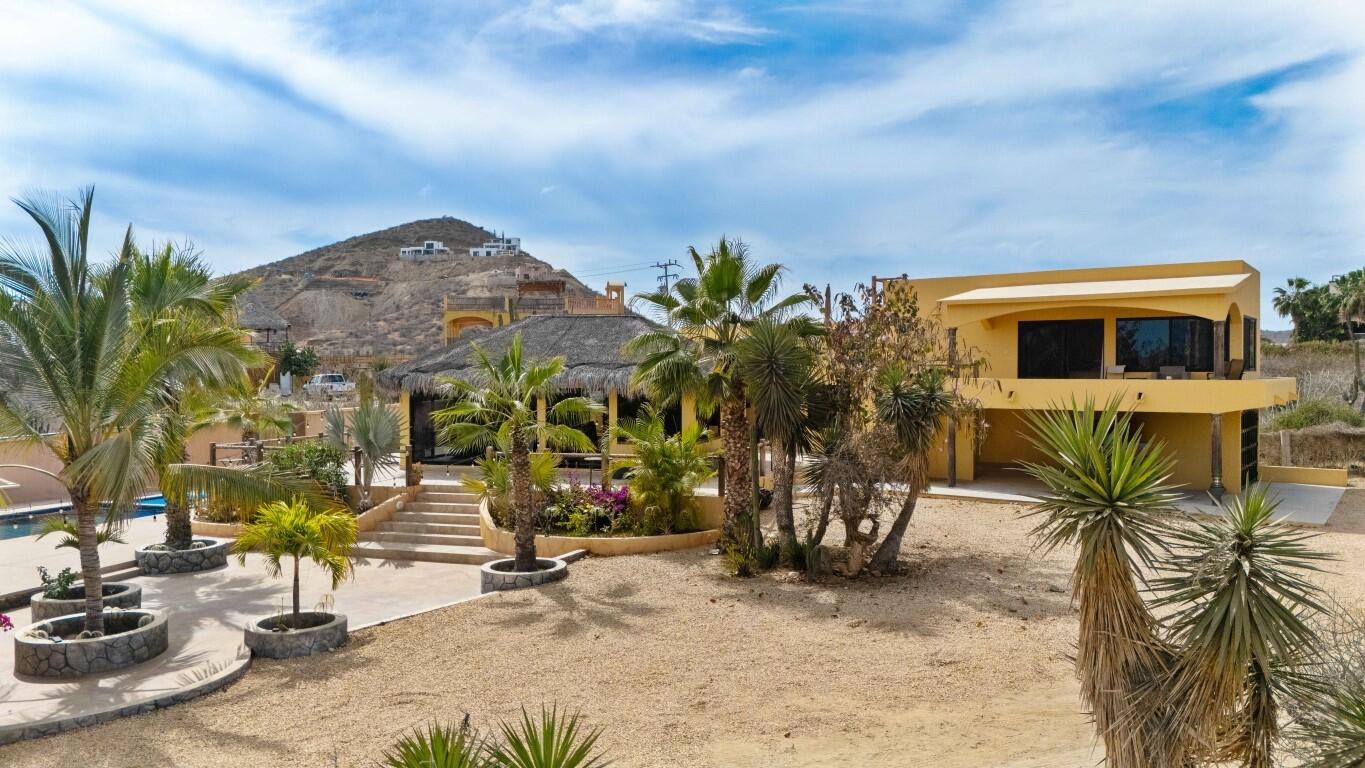 Pedregal Cerritos Rare opportunity just minutes from Cerritos Beach! This charming Hacienda-style home sits in a fully walled compound with two vehicle gates, side access, and a garage, with ample room to expand. Enjoy a solar-heated pool, hot tub, expansive patios, and gorgeous mature landscaping that creates a private oasis. Incredible ocean and mountain – Rancho Cerritos, Pacific, Pacific, BS