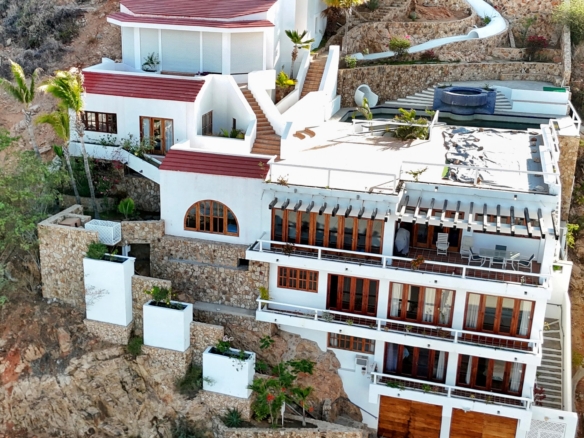 Pedregal Pedregal Csl Perched high above the marina and the Sea of Cortez, this extraordinary 10,000-square-foot estate is one of Pedregal's most iconic residences. Carved into the granite hillside, the property represents a remarkable piece of Cabo San Lucas history and offers an architectural experience unlike any other in Los Cabos.Panoramic – 115 Cam. Grande, Cabo San Lucas, BS
