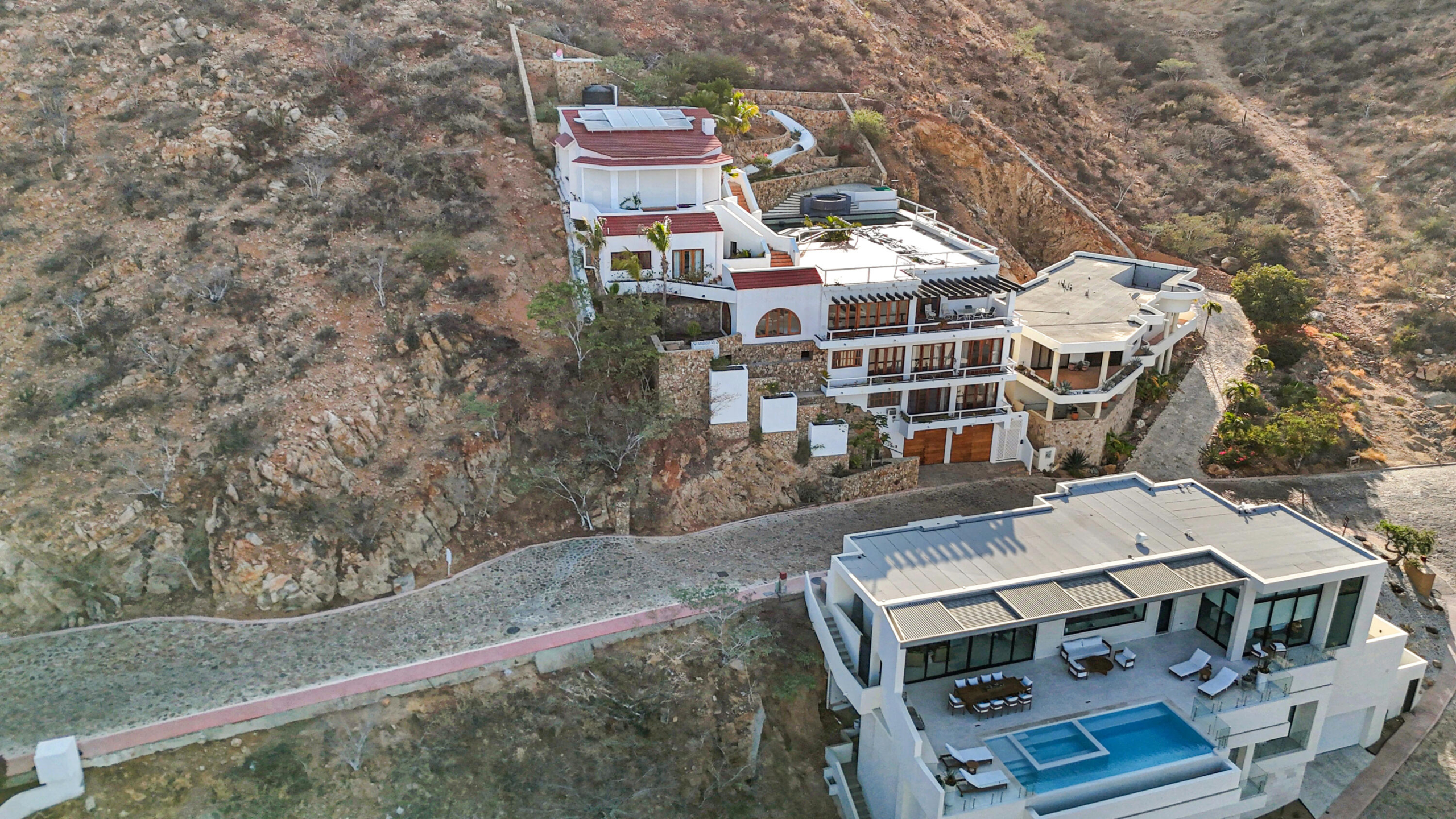 Pedregal Pedregal Csl Perched high above the marina and the Sea of Cortez, this extraordinary 10,000-square-foot estate is one of Pedregal's most iconic residences. Carved into the granite hillside, the property represents a remarkable piece of Cabo San Lucas history and offers an architectural experience unlike any other in Los Cabos.Panoramic – 115 Cam. Grande, Cabo San Lucas, BS